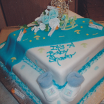 Designer Baby Shower Black Cake with Baby Shoes